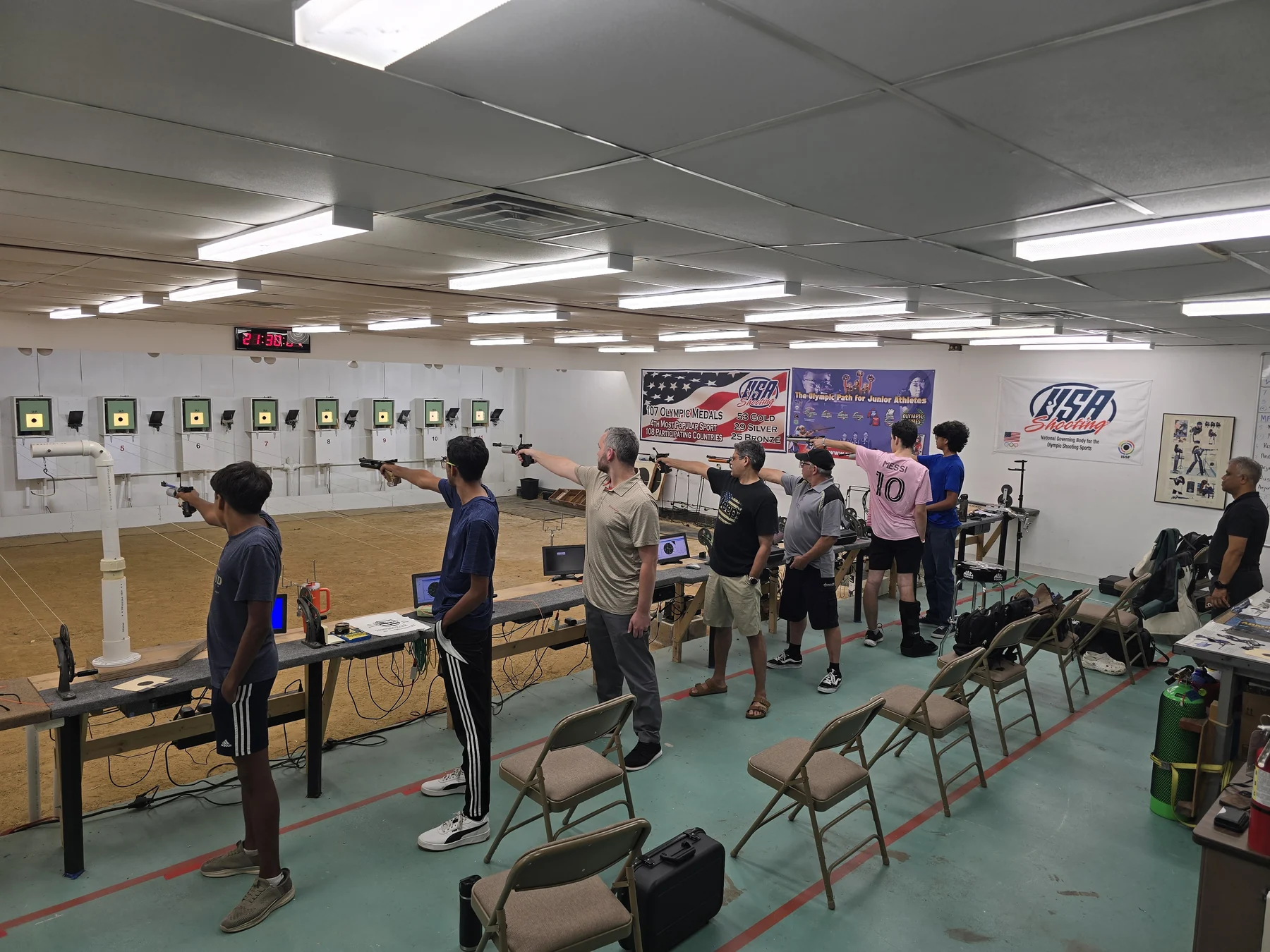 Air Pistol athlete training on an electronic-target line